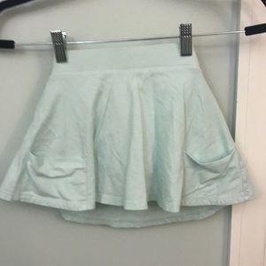 NWOT girls skort.  Light teal color. Never worn.